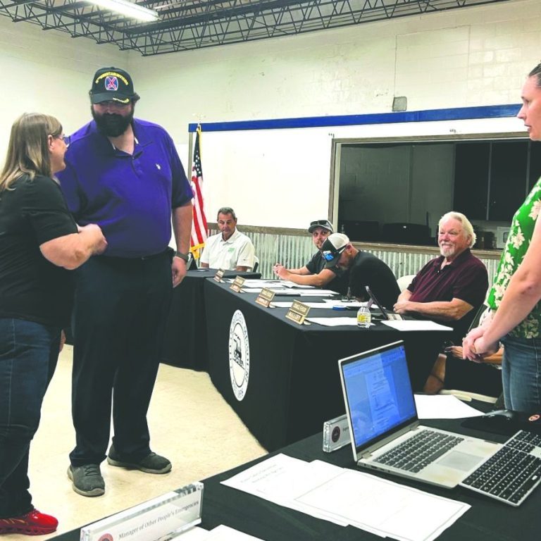 City Clerk giving tied candidates instructions